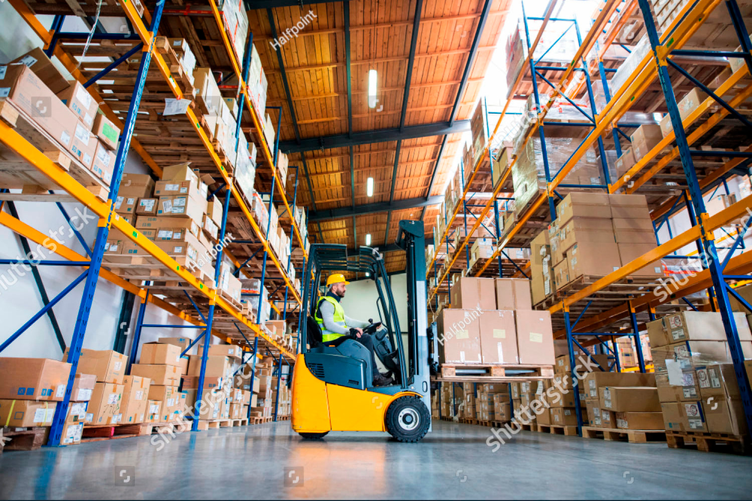 stock-photo-warehouse-man-worker-with-forklift-794138326